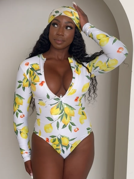 Sunkissed Citrus: A Head-Turning Lemon Print One-Piece for Resort Elegance with a Twist