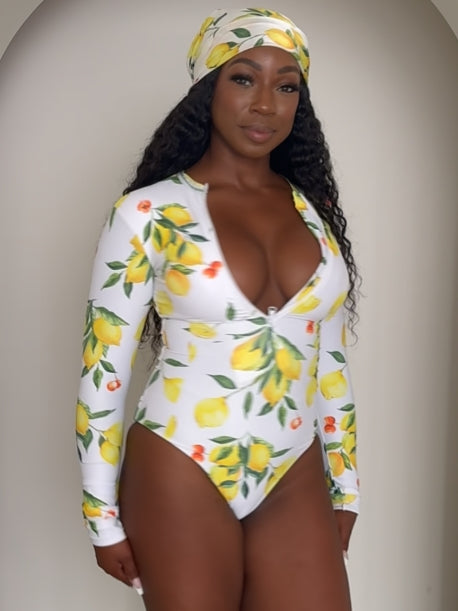 Sunkissed Citrus: A Head-Turning Lemon Print One-Piece for Resort Elegance with a Twist