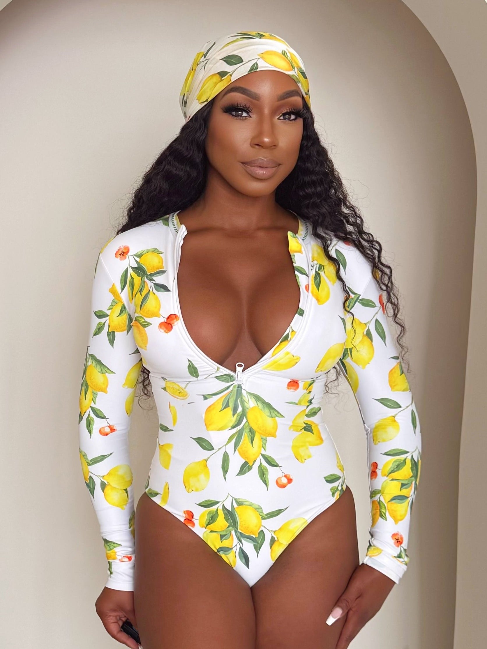 Sunkissed Citrus: A Head-Turning Lemon Print One-Piece for Resort Elegance with a Twist