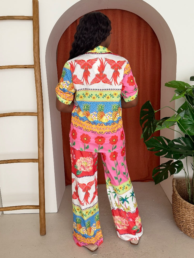 Tropical Fruit Print Resort Set – Colorful Vacation Outfit with Floral Shirt & Wide-Leg Pants | Resort Glam