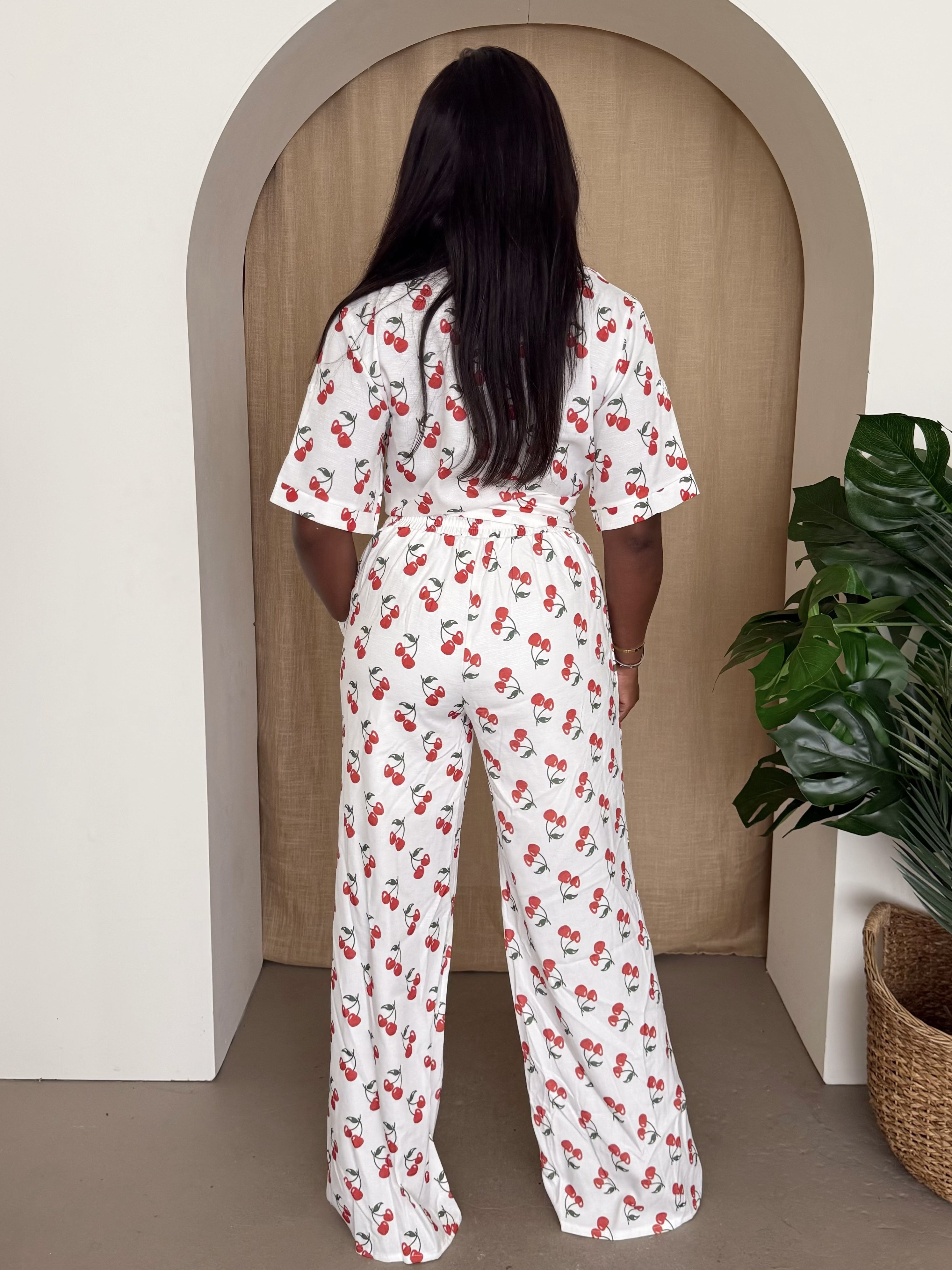 Cherry Bliss – White Two-Piece Tie-Front Shirt and Wide-Leg Pants Set for Playful Resort Style